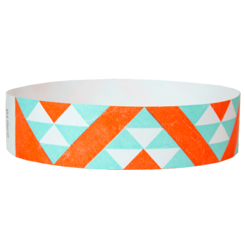 aqua and neon orange aztec pattern on a white tyvek wristband - round version shown