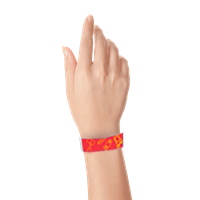 neon red wristbands with neon yellow candy design shown on a wrist
