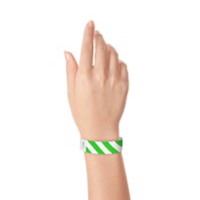 hand wearing white tyvek wristband with neon green diagonal stripes