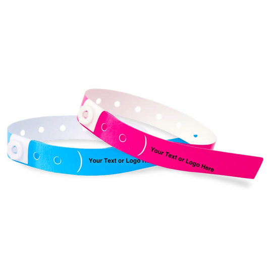 slim plastic wristbands shown in neon blue and neon pink with a placeholder to show where you can customize the wristband