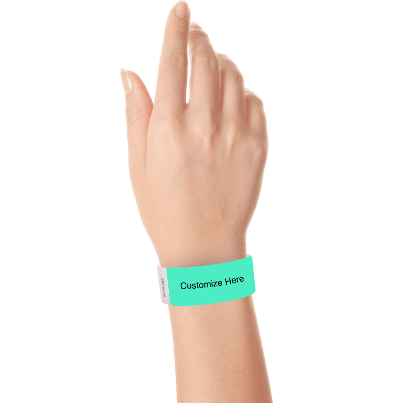 hand wearing a aqua tyvek 1" solid wristband with a placeholder to customize with your text or logo