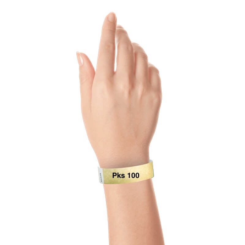 a hand wearing tyvek 3/4" solid wristband gold pks 100