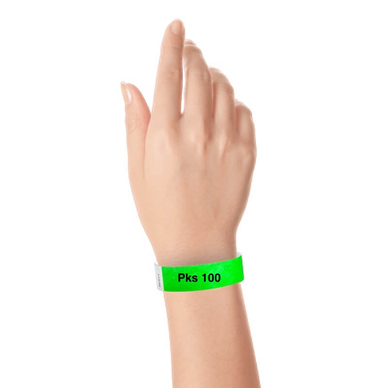 a hand wearing tyvek 3/4" solid wristband neon green pks 100