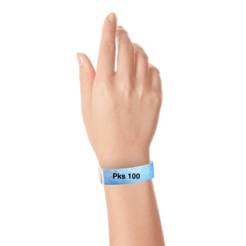 a hand wearing tyvek 3/4" solid wristband sky blue pks 100