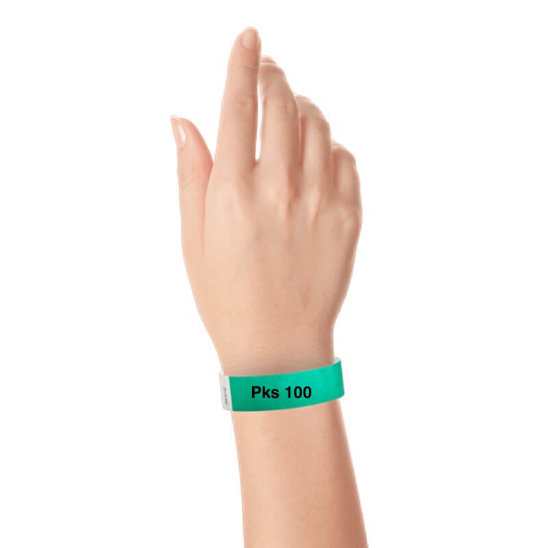 a hand wearing tyvek 3/4" solid wristband pantone green pks 100