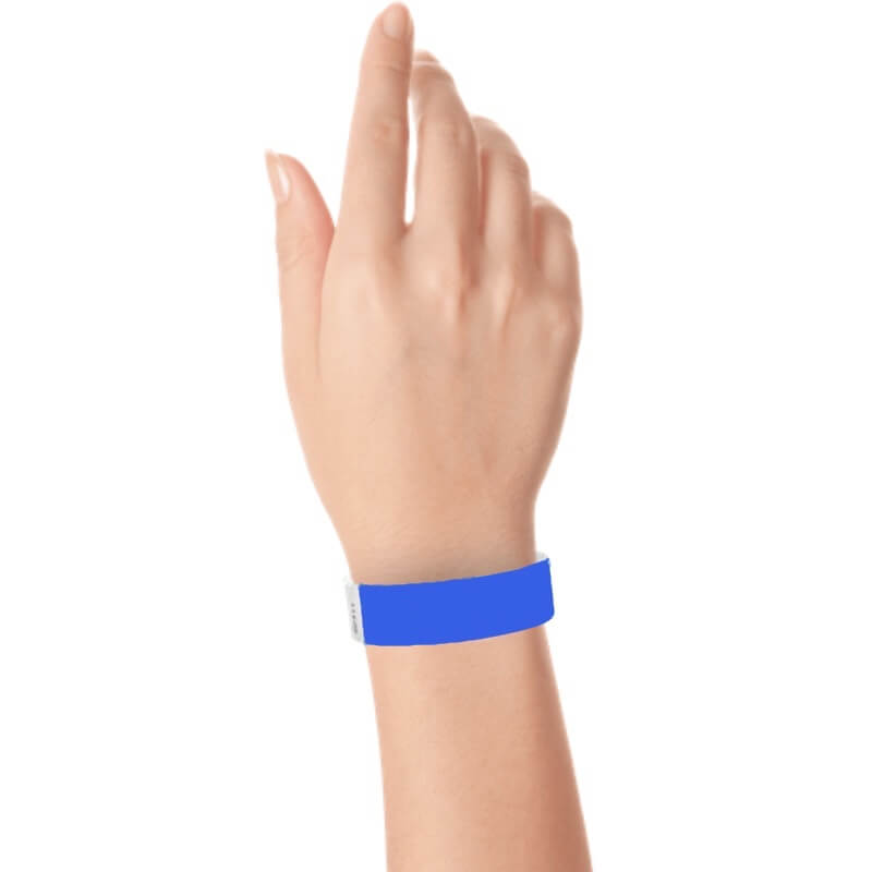hand wearing a 3/4" tyvek wristband solid marine blue
