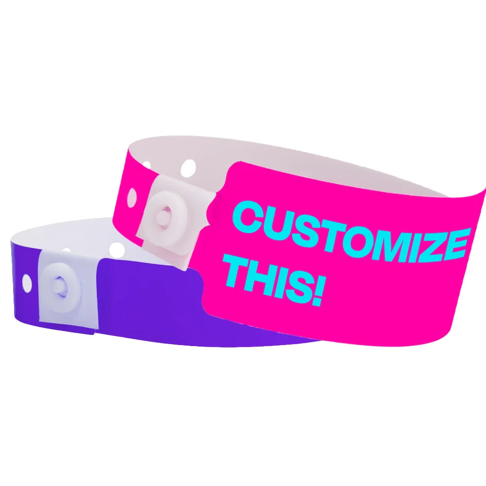 Plastic wristbands shown in regular purple, and custom neon pink wide face
