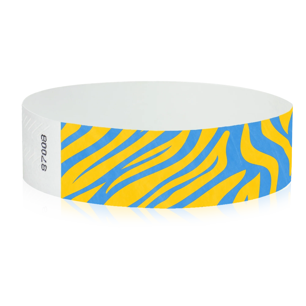 neon orange tyvek wristband with neon blue zebra pattern - round version shown