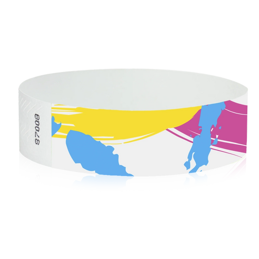 white tyvek wristband with paint stroke pattern in neon blue, neon pink and neon yellow - round version shown