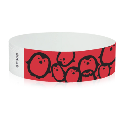 neon red Tyvek Wristband with black penguins - round version shown