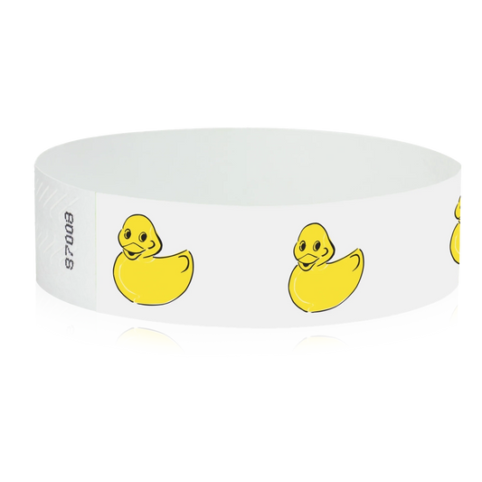 White tyvek wristband with yellow rubber duck illustrations - round version shown