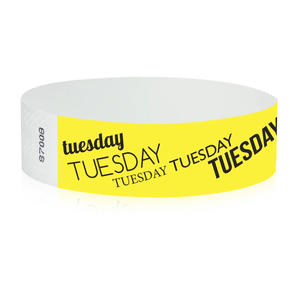 neon yellow tyvek wristband with tuesday text in black ink - round version shown