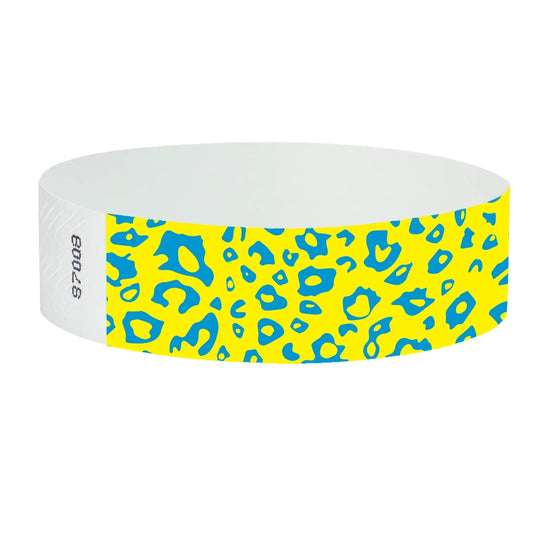 neon yellow tyvek wristband with neon blue cheetah pattern - round version shown