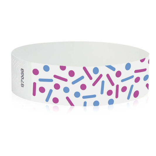 white tyvek wristband with neon pink and neon blue dots and lines - sprinkles - round version shown