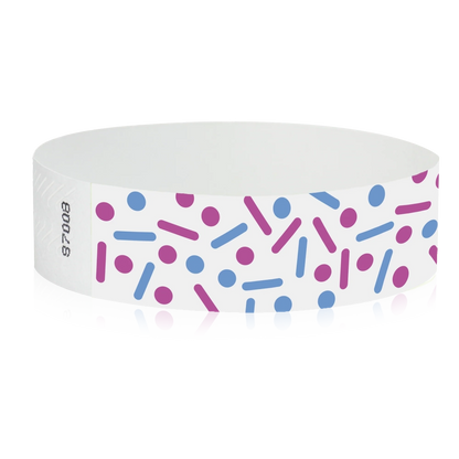 white tyvek wristband with neon pink and neon blue dots and lines - sprinkles - round version shown