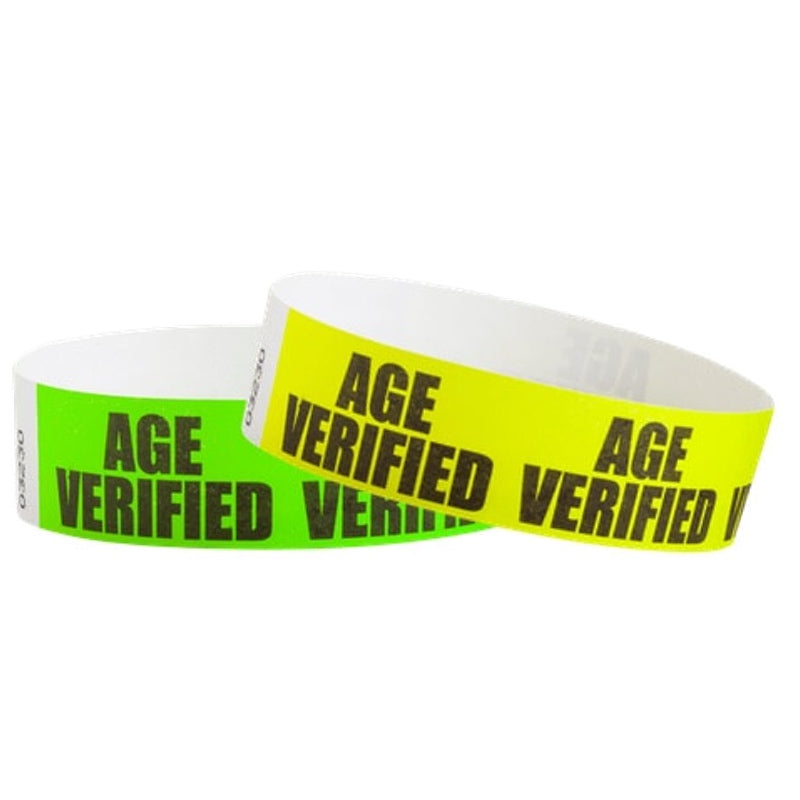 neon green and neon yellow tyvek wristbands with the text age verified repeated across the band