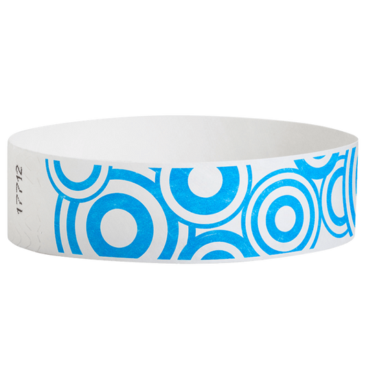neon blue disk pattern on a white tyvek wristband - round version shown