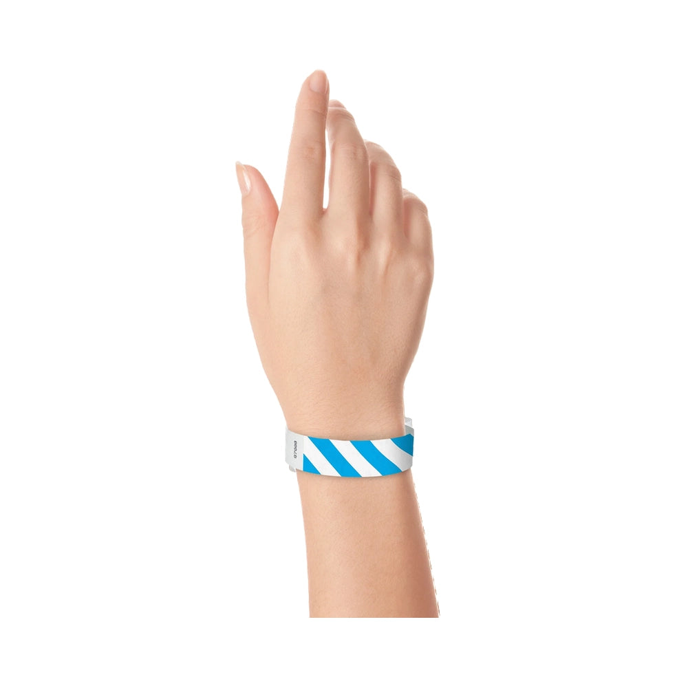 hand wearing white tyvek wristband with neon blue diagonal stripes