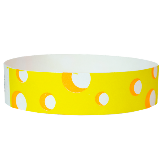 white tyvek wristband with neon yellow cheese pattern - round version shown