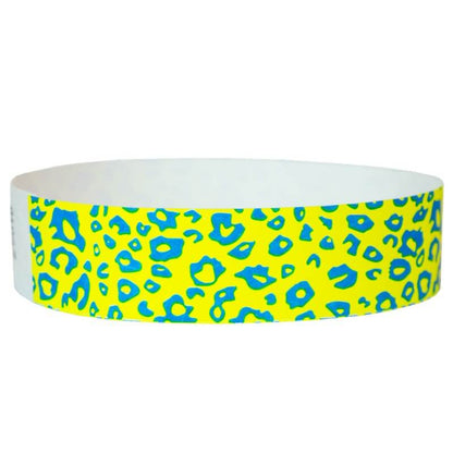 neon yellow tyvek wristband with neon blue cheetah pattern - round version shown