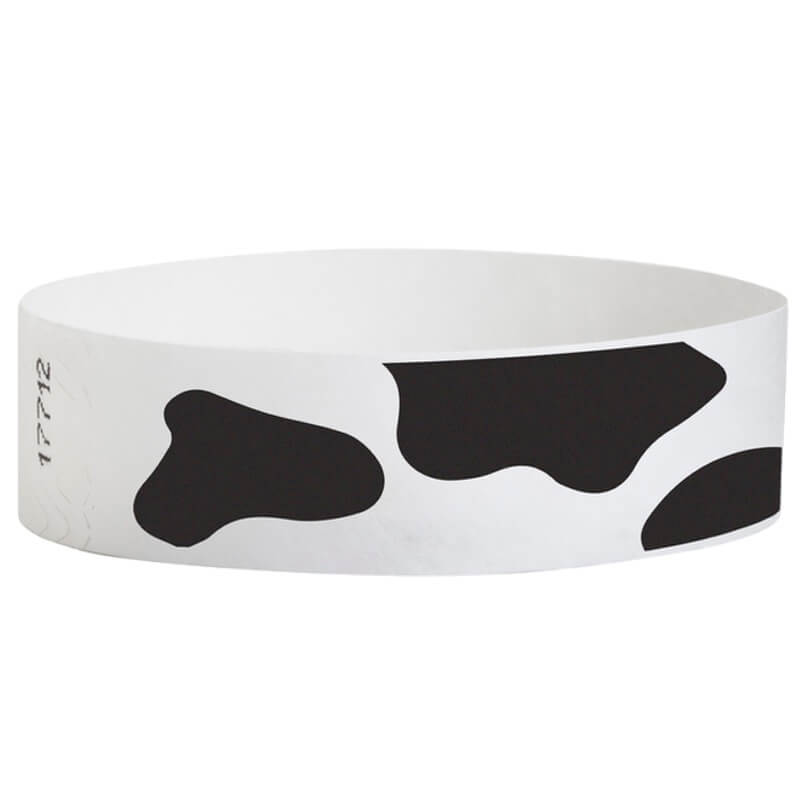 white tyvek wristband with cow pattern - round version shown