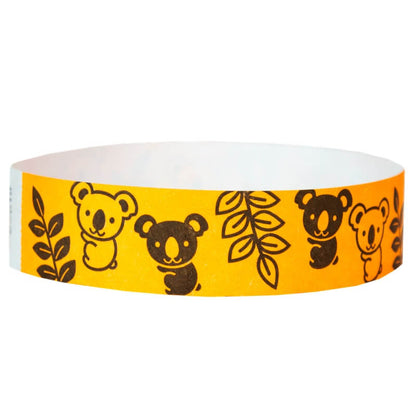 neon orange tyvek wristband with black koalas and leaves - round version shown