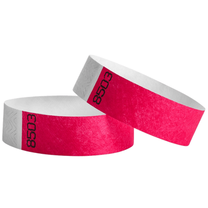 duplicate number sets in neon pink tyvek 3/4" wristbands - shown in round 