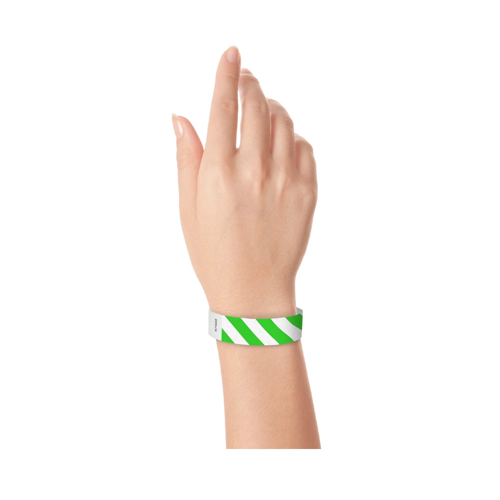 hand wearing white tyvek wristband with neon green diagonal stripes