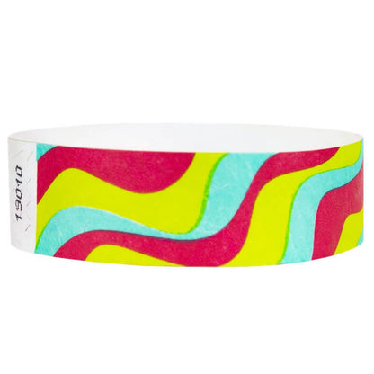 aqua, neon red, neon yellow wavy stripe pattern on a tyvek wristband - round version shown