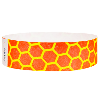 neon orange tyvek wristband with neon yellow honeycomb pattern - round version shown