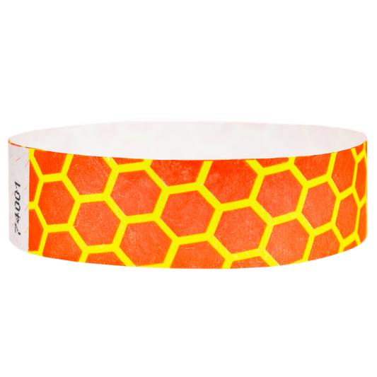 neon orange tyvek wristband with neon yellow honeycomb pattern - round version shown