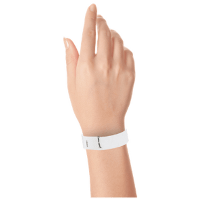 hand wearing a litter free tyvek 3/4" wristband in white