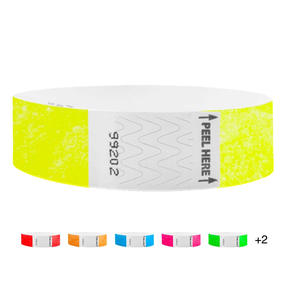 Tyvek 3/4 Litterfree wristband in neon yellow, with five smaller versions under in the colors neon red, neon orange, neon blue, neon pink and neon green. 