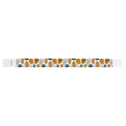 White wristband with colourful leaf pattern in gold, silver and green - flat version shown 