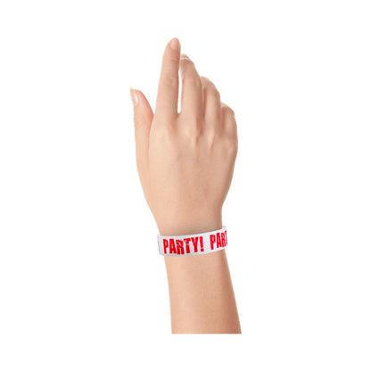 wrist wearing a white tyvek wristbands with neon red lettering - Party!
