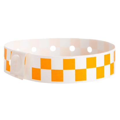 Plastic wristband with a orange and white checkerboard pattern - shown in round