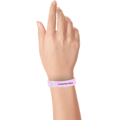 Hand wearing slim plastic wristband with a placeholder to show where you can customize the wristband shown in lavender