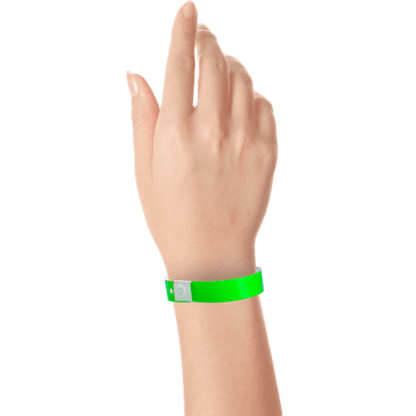 hand wearing plastic slim solid wristband in neon green