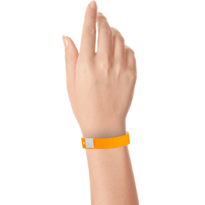 hand wearing plastic slim solid wristband in neon orange 