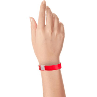 hand wearing plastic slim solid wristband in neon red 