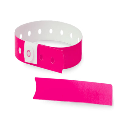 Plastic slim wristband with stub in neon pink - shown in round 