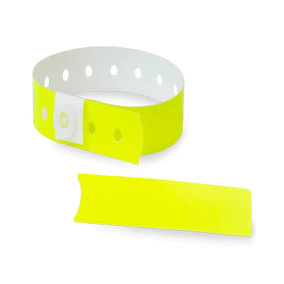 Plastic slim wristband with stub in neon yellow - shown in round 