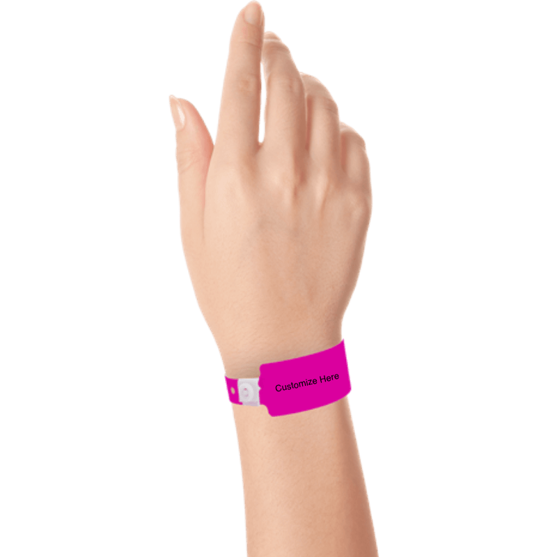 wide face plastic wristbands with a placeholder to show where you can customize the wristband on hand in neon pink