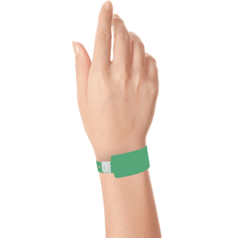 Wide face plastic solid wristband on hand in pantone green