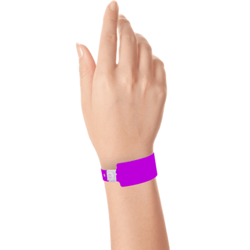 Wide face plastic solid wristband on hand in pantone purple