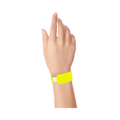 wrist wearing Plastic wide face wristband in neon yellow 
