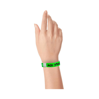 Plastic age verified wristband in neon green with text "AGE √ERIFIED" in black printed on the band - shown on wrist 