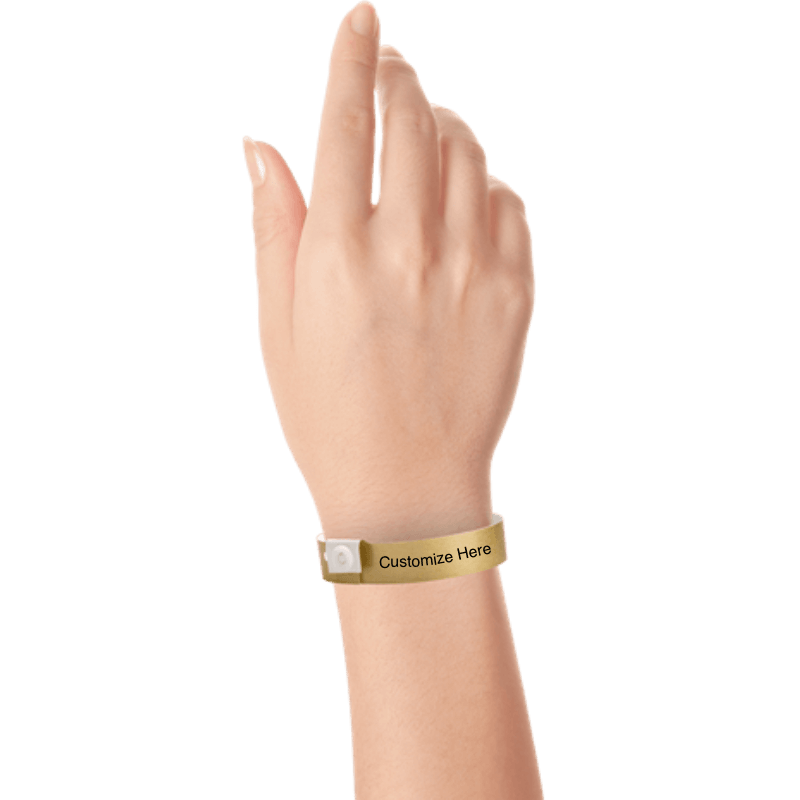 hand wearing plastic regular 3/4" wristband with a placeholder to show where you can customize the wristband in gold