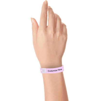 hand wearing plastic regular 3/4" wristband with a placeholder to show where you can customize the wristband in lavender