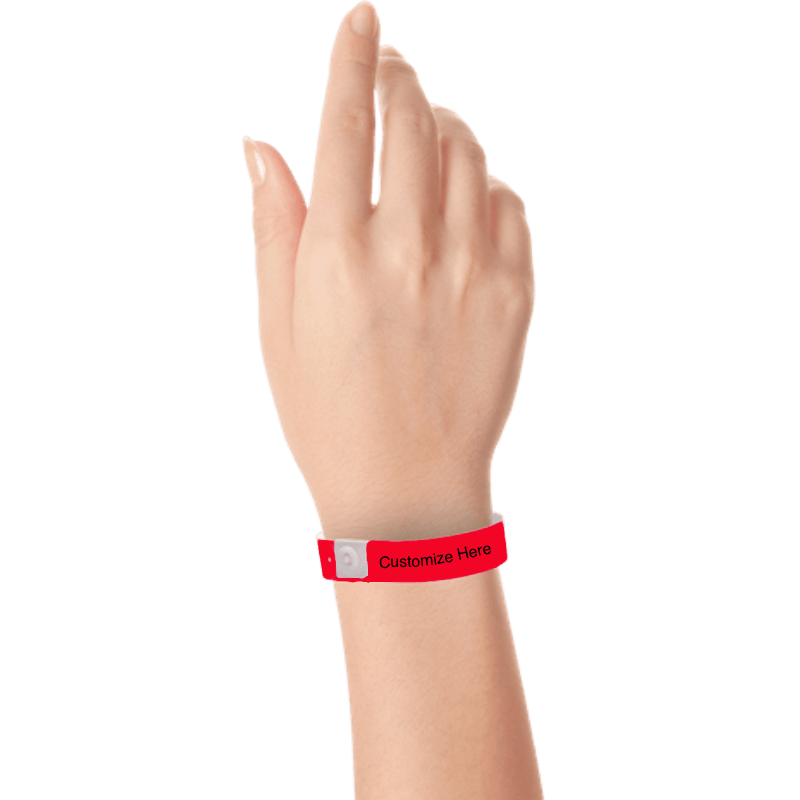 hand wearing plastic regular 3/4" wristband with a placeholder to show where you can customize the wristband in neon red